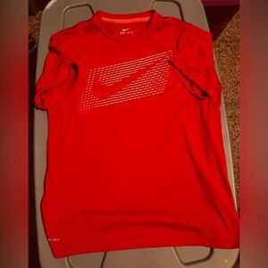 Nike boys size youth XL red dry fit, short sleeve shirt.